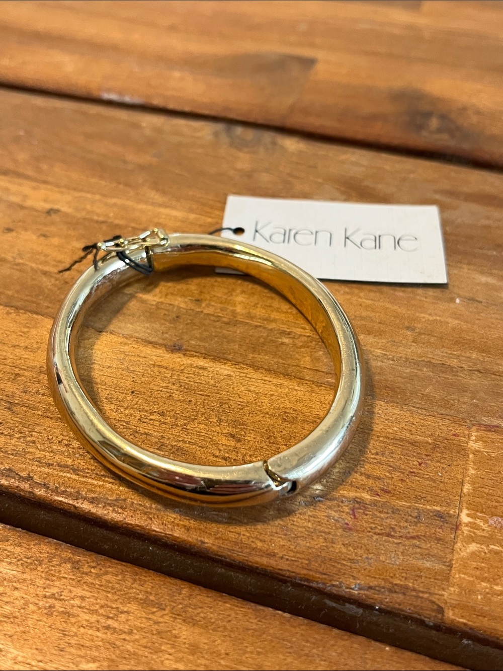 Karen Kane Shiny Gold-Tone Rounded Hinged Bangle